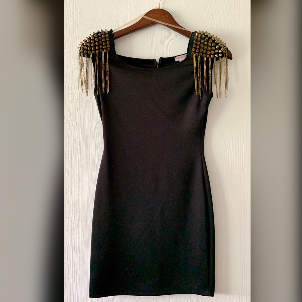 Black dress with spikes on shoulders